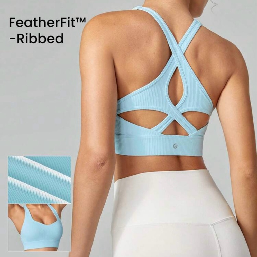 Baby blue sports bra with criss cross back. Size small ❤️